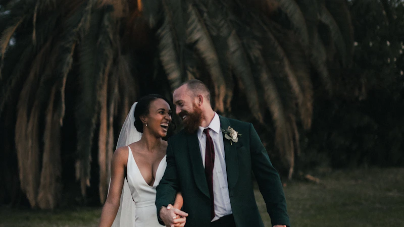 Bride and groom walking together during outdoor wedding photography session